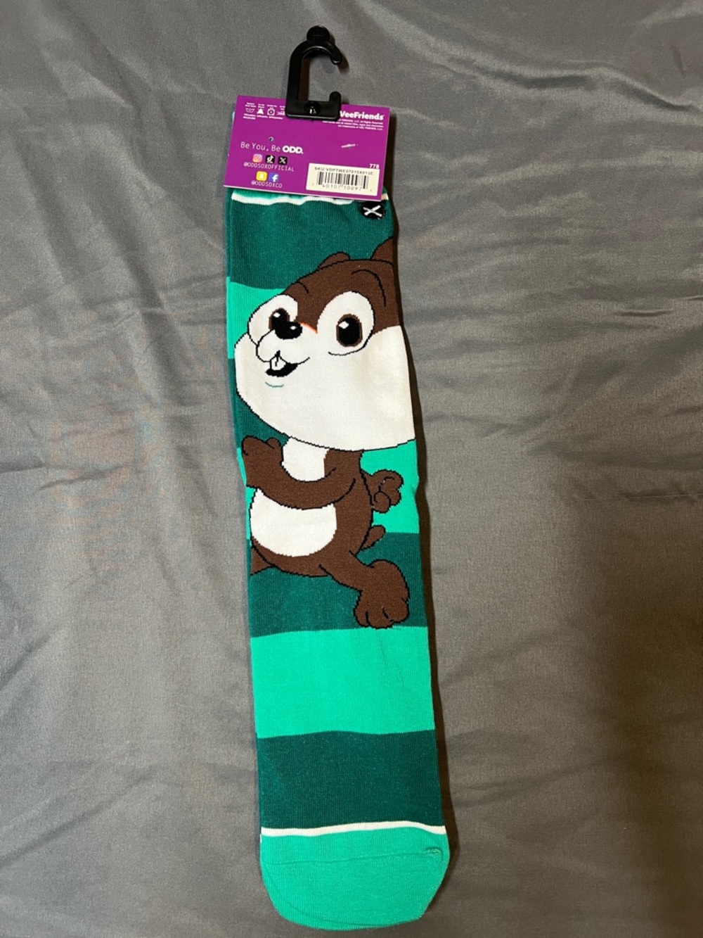Odd Sox vee friends Hustling hamster striped crew socks.